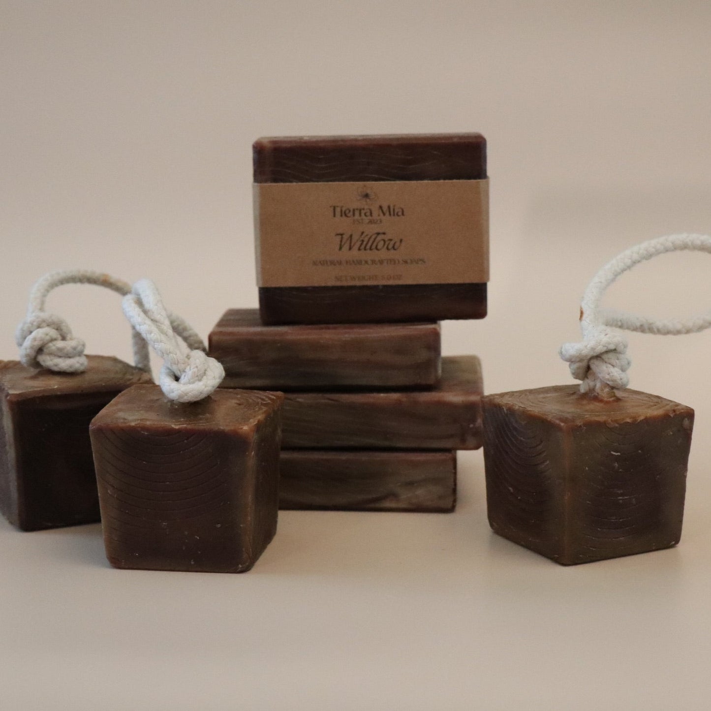 Brown Wood Grain Inspired soap bars with rope handles on a beige background