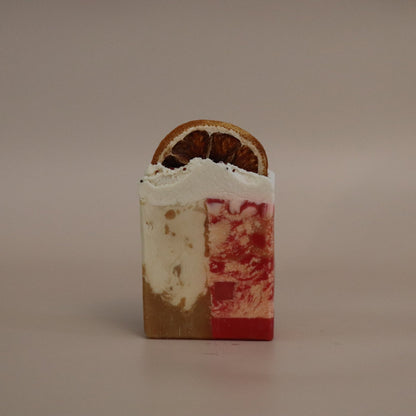 Small rectangular soap with artistic design on a beige background