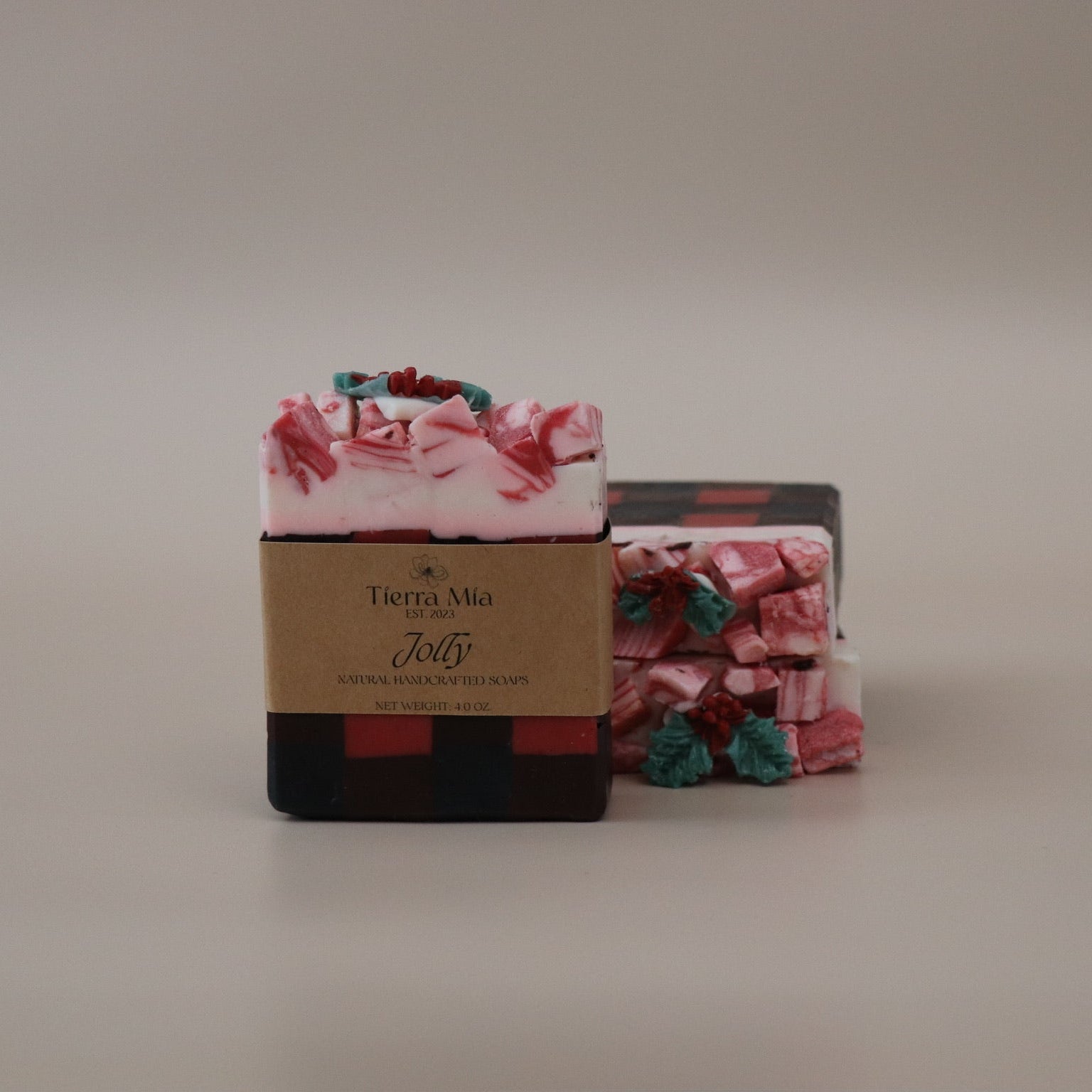 Two bars of soap on a beige background